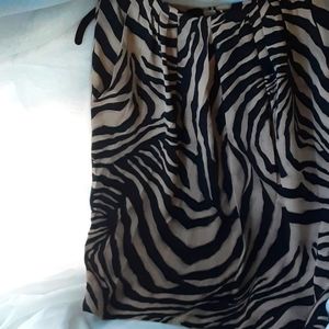 100% Silk Size 10 Petite.  (Smaller than that) measure next